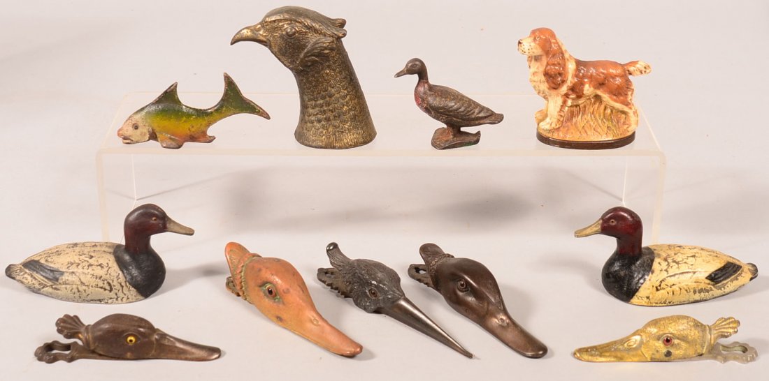 Lot of 11 various animal form metal bottle openers and: Lot of 11 various animal form metal bottle openers and letter holders. Including ducks, woodcock, pheasant, fish and cocker spaniel forms in cast iron, brass and spelter metals, all have the original 