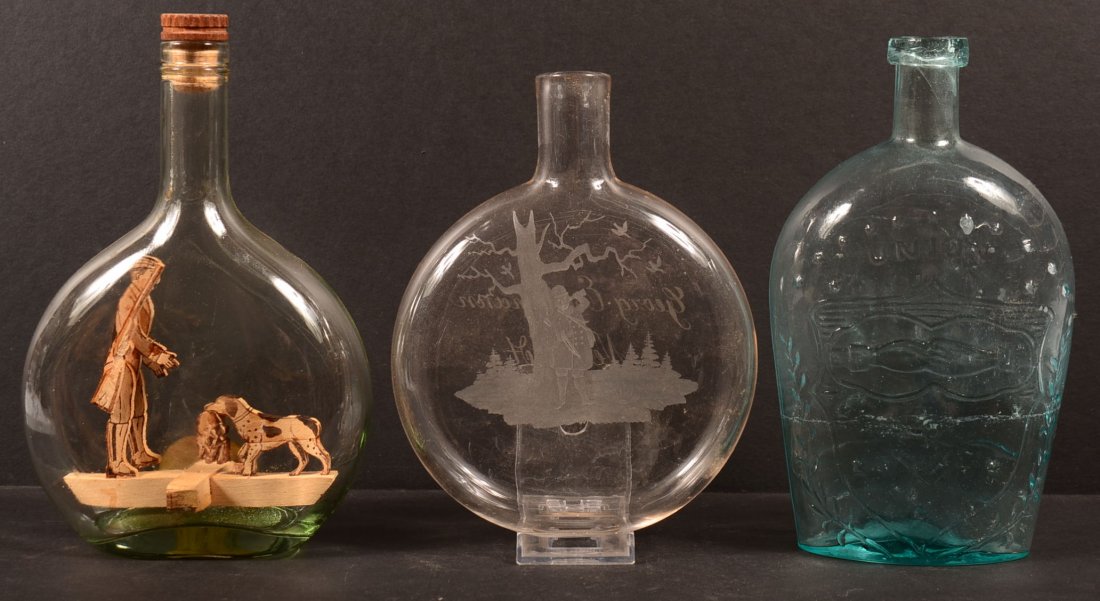 Three various antique and vintage flasks. GIV-41: Three various antique and vintage flasks. GIV-41 CLASPED HANDS, MASONIC AND EAGLE HISTORICAL FLASK, aquamarine, half pint, embossed "UNION" above shield on obverse and "H&S" below eagle on reverse, po