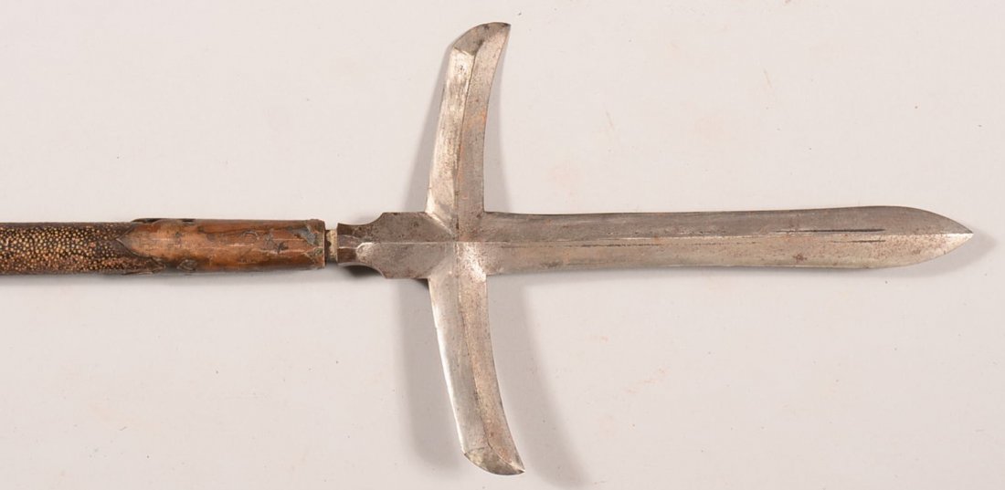 Japanese Magari Yari having a shaft partially covered: Japanese Magari Yari having a shaft partially covered with same' and is metal banded. 9" long by 6-1/2" wide head, 97-1/2" overall. Condition: very good