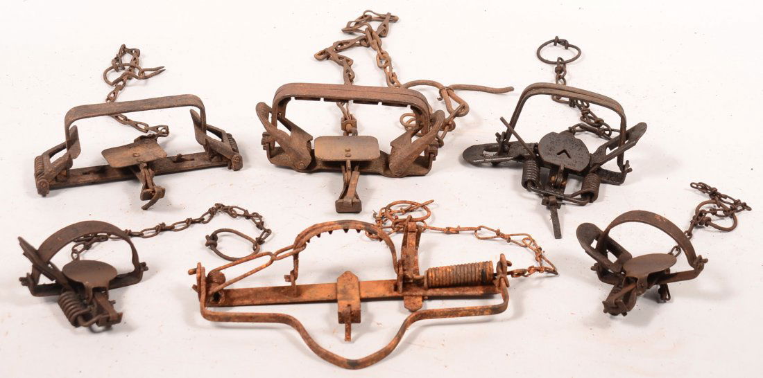 Lot of (6) vintage coil spring steel animal traps: Lot of (6) vintage coil spring steel animal traps including Easy Set Square Grip No. 2, Victor No. 2, W.A. Gibbs & Son Kingbee No. 1 (2 ea.); and a Triple Clutch Kangaroo No. 3 by Triumph Trap Co. wit