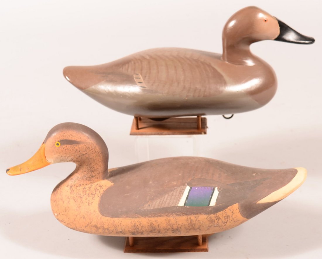 Decoy lot of (2) Madison Mitchell: (1) 1982 Mallard hen: Decoy lot of (2) Madison Mitchell: (1) 1982 Mallard hen and (1) 1975 Canvasback hen. Condition: fine to excellent