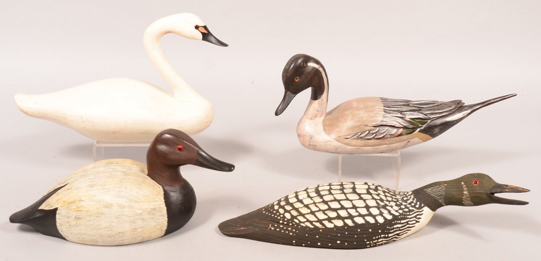 Decoy lot of (4): Chas. Moore 1992 signed Pintail; Loon: Decoy lot of (4): Chas. Moore 1992 signed Pintail; Loon "WEK"; Canvasback 1985 Bucks County; swan carving. Condition: fine to excellent