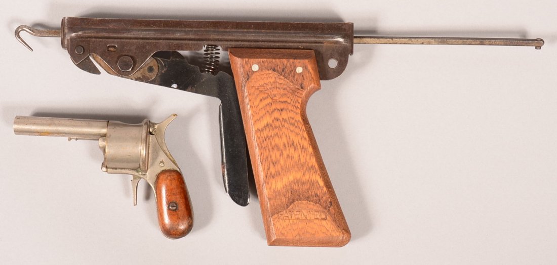 Lot of (2) handgun shaped tools: a nickel plated: Lot of (2) handgun shaped tools: a nickel plated "revolver" cigar cutter with wood grips; plus an aircraft safety wire twister having a wood grips with the U.S. Air Force logo stamped at the top and "