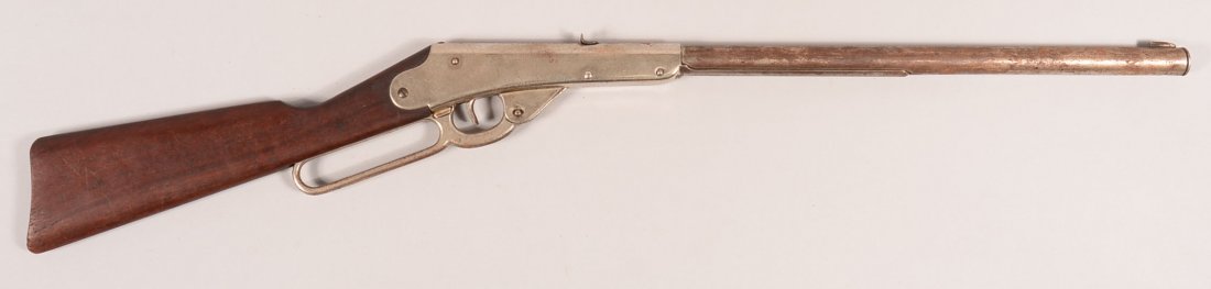 Daisy nickel plated Model "B" 1,000 shot lever action: Daisy nickel plated Model "B" 1,000 shot lever action air rifle having a cast iron lever and wood stock. Condition: 80-90% frame and lever nickel, 60-70% barrel, good stock.
