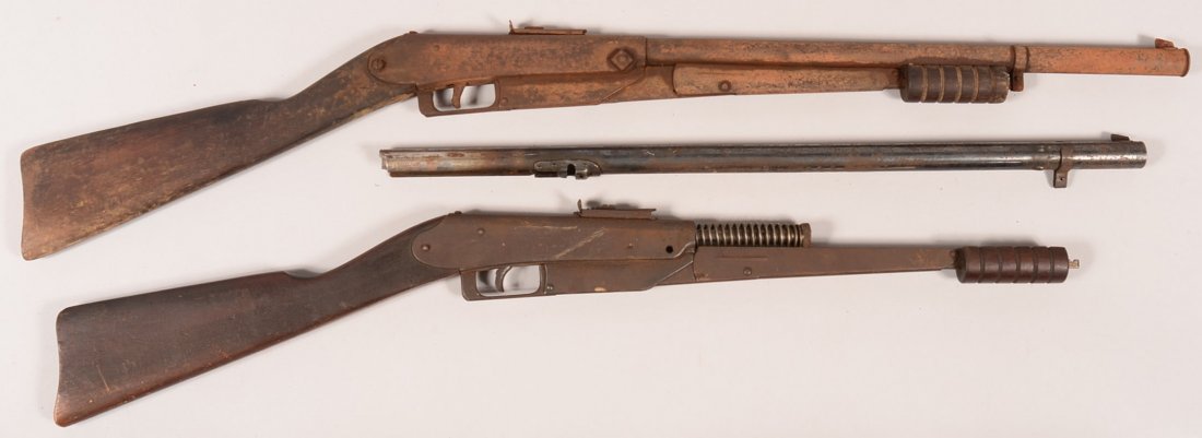 Lot of (2) Daisy No. 25 blued pump action air rifles: Lot of (2) Daisy No. 25 blued pump action air rifles circa 1920's having straight grip wood stocks with 5-groove forearms, thick rear bow on triggerguard with frame rivet above the front bow, pump lin