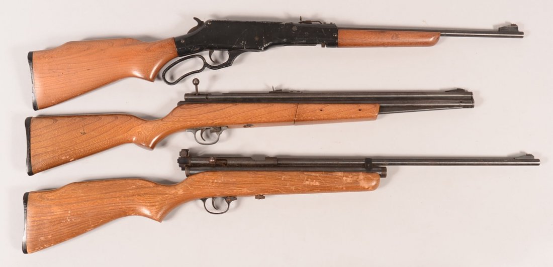 Lot of (3) Crosman 22 caliber air rifles with wood: Lot of (3) Crosman 22 caliber air rifles with wood stocks: a model 99 lever action; a model 1400 pump action; and a 160 Pellgun Co2 powered. Condition: good to very good.