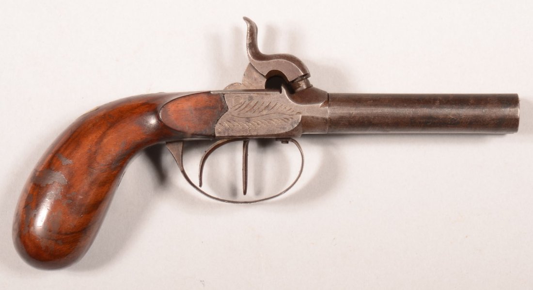 Belgian proofed double barreled percussion pistol: Belgian proofed double barreled percussion pistol having 3" round barrels and a German silver escutcheon. 7-1/2" o/a . Condition: fine with much of the original finish and sound grips, good working or