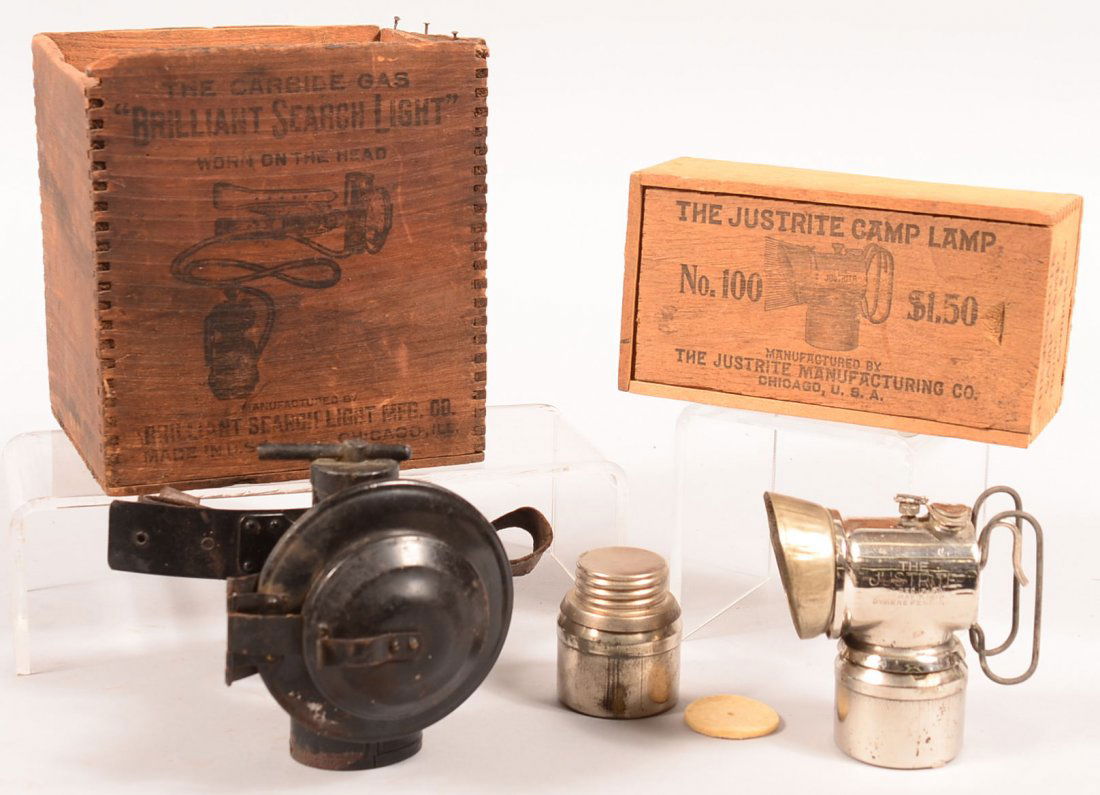 Lot of (2) vintage headgear lamps. The first is a: Lot of (2) vintage headgear lamps. The first is a carbide gas "Brilliant Search Light" made by Brilliant Search Light Mfg Co and still in its original finger joint wood box. The second is "The Justrit