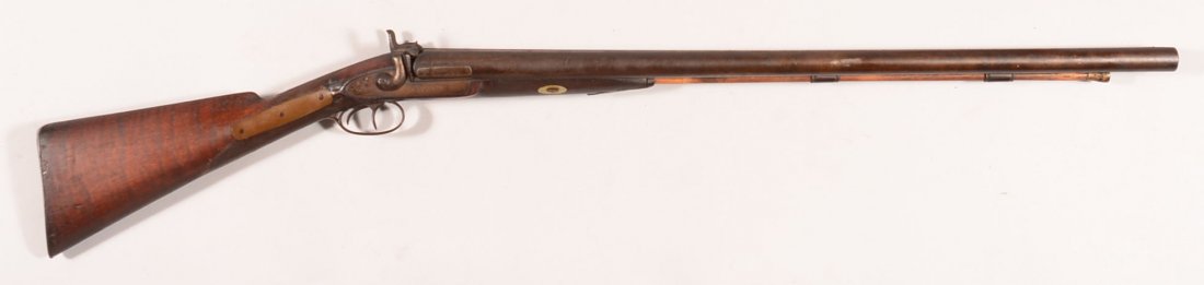 Heavy double barrel SxS percussion shotgun having 7: Heavy double barrel SxS percussion shotgun having 7 gauge 31-3/4" barrels, engraved locks, and german silver escutcheons on the barrel wedges. The bores measure 0.89". Condition: smooth dark patina on