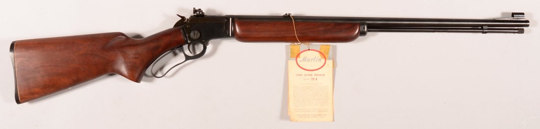 CR. Marlin model 39A lever action tube fed rifle, 22 rf: CR. Marlin model 39A lever action tube fed rifle, 22 rf 24" round barrel with front sight hood, sn J-6893 with blued receiver and a Lyman 66L receiver peep sight. Condition: like new with the hang tag