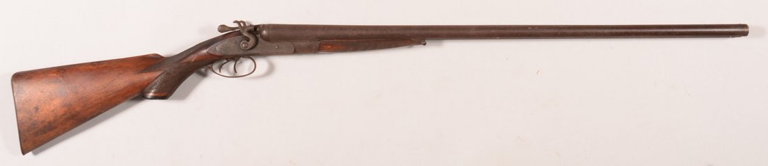W. Richards double barrel SxS hammer shotgun having 12: W. Richards double barrel SxS hammer shotgun having 12 gauge 29-3/4" damascus barrels, engraved receiver and locks with game scenes, checkered pistol grip, and fancy grain stock. Condition: dark untou
