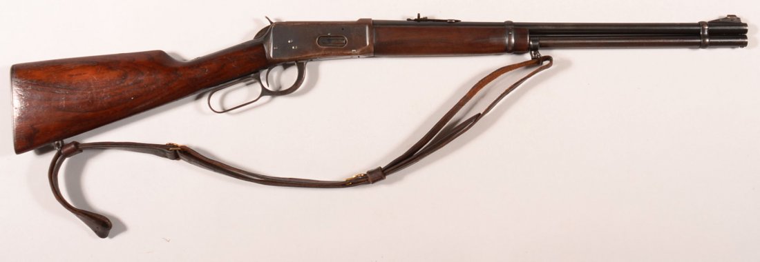 CR. Winchester model 94 lever action carbine having a: CR. Winchester model 94 lever action carbine having a 32 Win Spl caliber 20" barrel, sn 1828263 (made 1952). Condition: good with carry wear but no abuse. Bright bore.