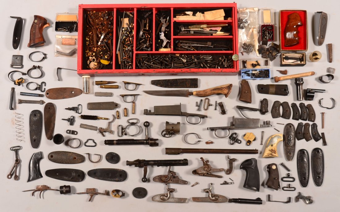 Large lot of assorted gun parts for rifles and pistols.: Large lot of assorted gun parts for rifles and pistols. Condition: fair to very good.