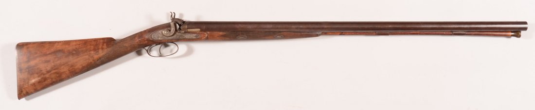 Engraved large bore 7 gauge percussion double barrel Sx: Engraved large bore 7 gauge percussion double barrel SxS shotgun by J.E. Evans, Philadelphia, having 34-3/8" barrels, scroll engraving locks and iron mountings, and a checkered wrist and forearm (2 we