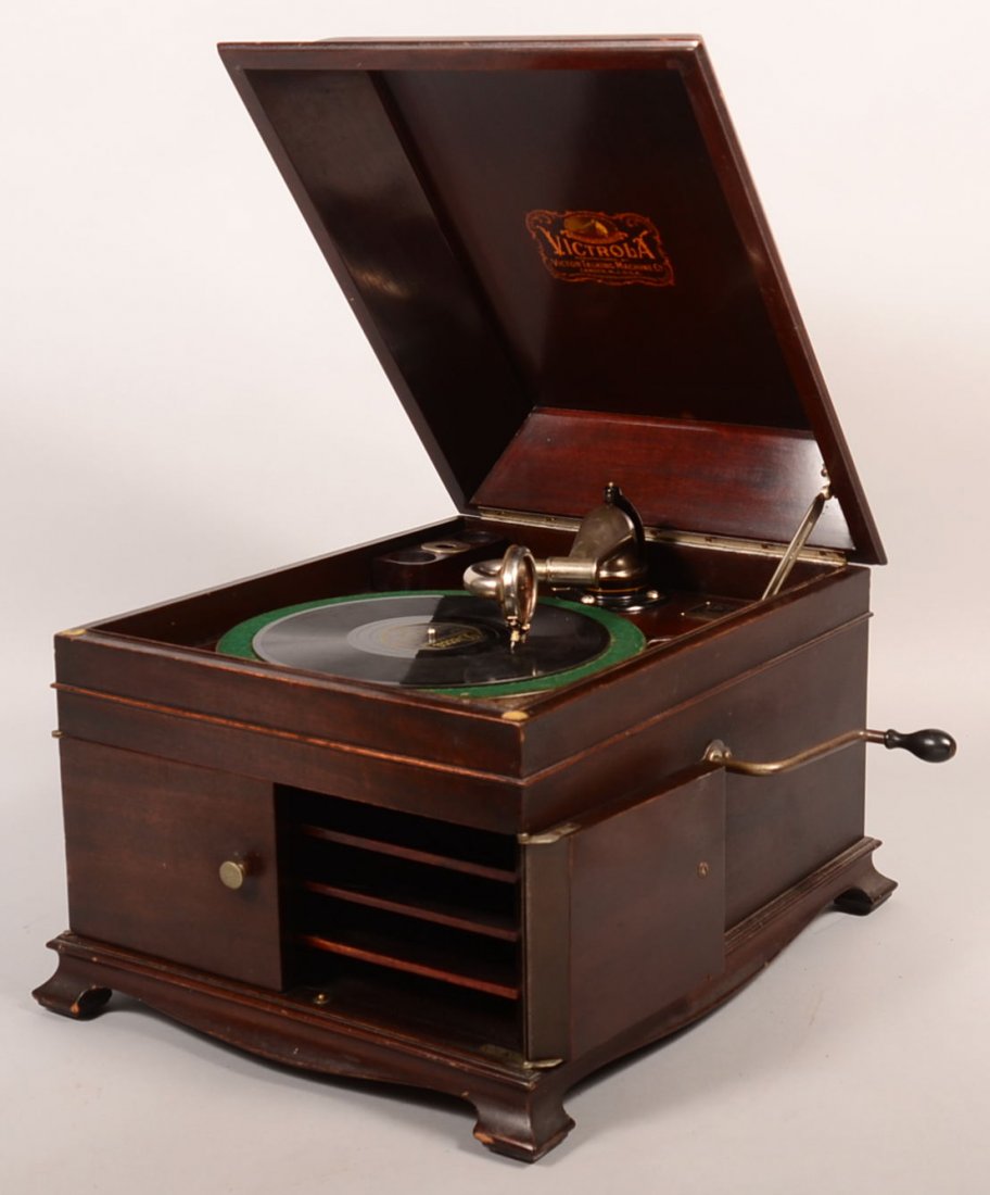 Victrola Table Top Phonograph. Mahogany case, Model #: Victrola Table Top Phonograph. Mahogany case, Model # VV-IX 246530G, label marked Victrola talking Machine Co. Camden, NJ USA. Working condition, 14-1/2"h, x 17"w. x 20-1/2"d. Condition: Very good.