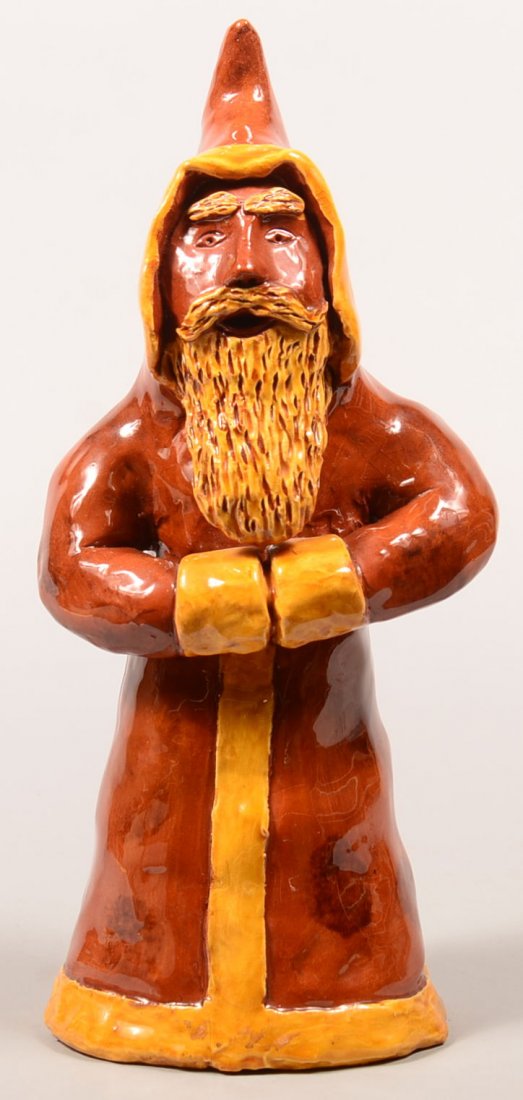 Large James J. Nyeste Hand Molded Redware Pottery Santa: Large James J. Nyeste Hand Molded Redware Pottery Santa Claus Figure. Signed under base "James J. Nyeste, Seven Valleys, PA, 1986", 13-1/4"h. Condition: Very good.