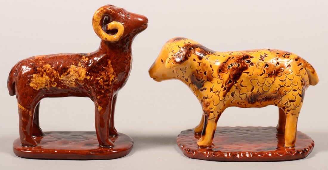 Two Breininger Manganese Glazed Redware Pottery Animal: Two Breininger Manganese Glazed Redware Pottery Animal Figures on slab bases. Ram, 5-3/4"h. and a lamb 4-1/2"h., both dated 1989. Condition: Very good.