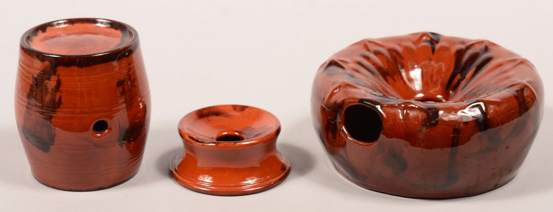 Three Various Breininger Redware Pottery Pieces. Two: Three Various Breininger Redware Pottery Pieces. Two cuspidors, 3-3/4" and 7-1/4" diam. and a brandy keg, 4-1/4"h. Condition: Very good.