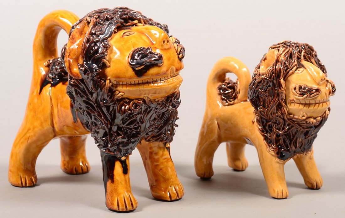 Two James J. Nyeste Hand Molded Redware Pottery Lion: Two James J. Nyeste Hand Molded Redware Pottery Lion Figures, (Copies of Shenandoah pottery). Standing lions with yellow ground glazed, applied spaghetti pottery manes and tail, signed "James J. Nyest