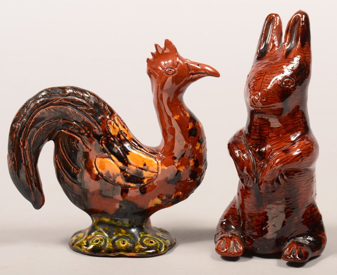 Two James J. Nyeste Molded Redware Pottery Animal: Two James J. Nyeste Molded Redware Pottery Animal Figures. First is a stylized rooster on slab base signed "J.J.N. 82", 5-3/4"h. Second is a rabbit stand on hind legs, Unsigned, 6-1/4"h. Condition: Ve
