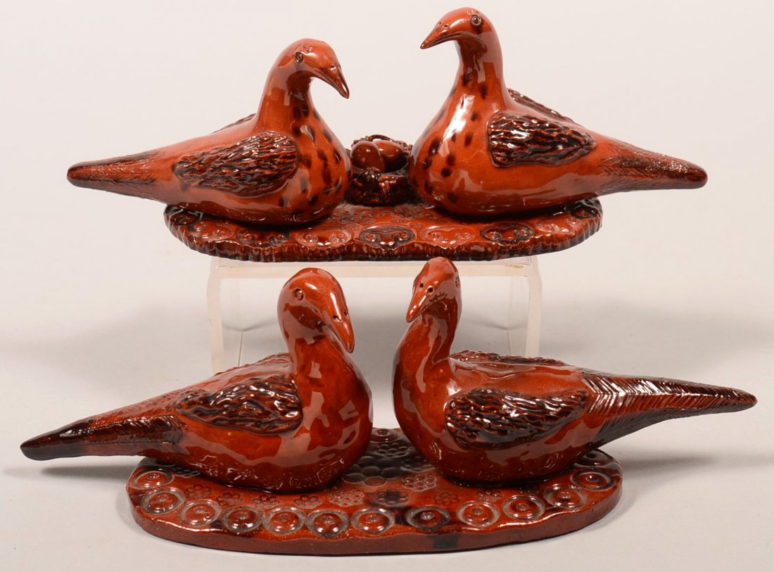 Two James J. Nyeste Hand Molded Redware Pottery Bird: Two James J. Nyeste Hand Molded Redware Pottery Bird Figures. Two pairs of birds on slab bases signed "James J. Nyeste, Seven Valleys, PA, TWO LOVE BIRDS". One with nest containing two eggs, 10-3/4"l.