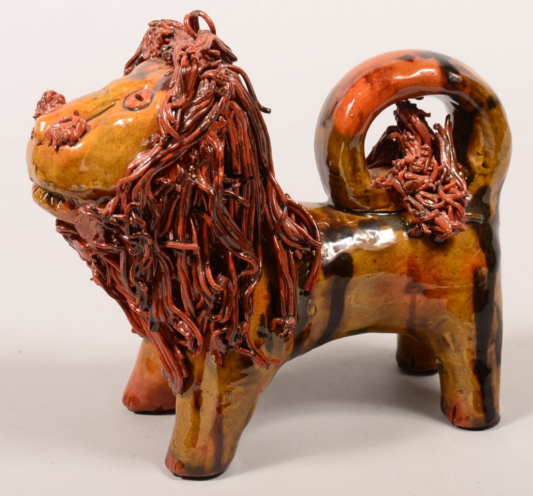 Large Breininger Redware Pottery Lion Figure, (Copy of: Large Breininger Redware Pottery Lion Figure, (Copy of Shenandoah pottery). Standing lion with unusual dark green ground mottled glazed, applied red and brown glazed spaghetti pottery manes and tail,