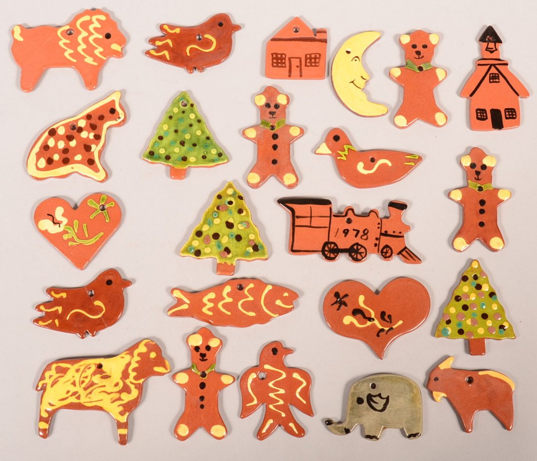 Lot of 23 Breininger Redware Pottery Figural Christmas: Lot of 23 Breininger Redware Pottery Figural Christmas Tree Ornaments. Including various animals, fish, birds, train, hearts, crescent moon and more. Dated 1970's, 80's and 90's. 2" to 5" long. Condit