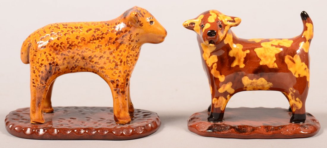 Two Breininger Redware Pottery Animal Figures. Standing: Two Breininger Redware Pottery Animal Figures. Standing Lamb dated 1998, 5"l., and a standing dog dated 1999, 4"l. Condition: Very good.