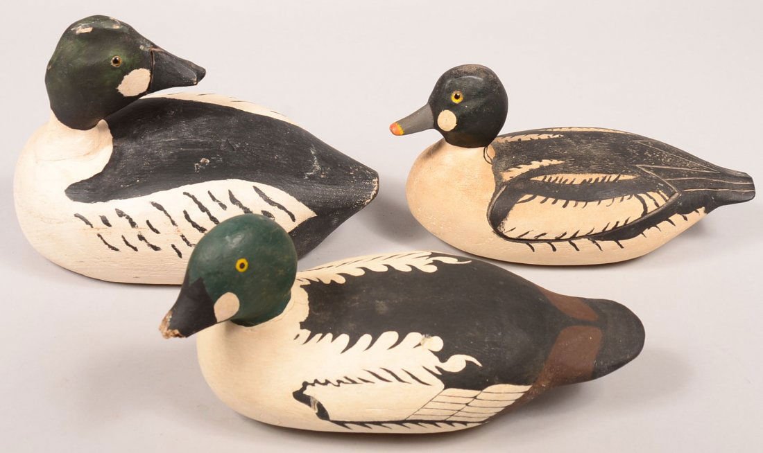 Three Goldeneye Duck Decoys. Sleeper with keel and: Three Goldeneye Duck Decoys. Sleeper with keel and weight, lead anchor, Mink River, WI. 11-1/2"l. One marked American Golden Eye Whistler and stamped Zeke, 11-3/4"l. One marked T. Larson Gladstone, Mi