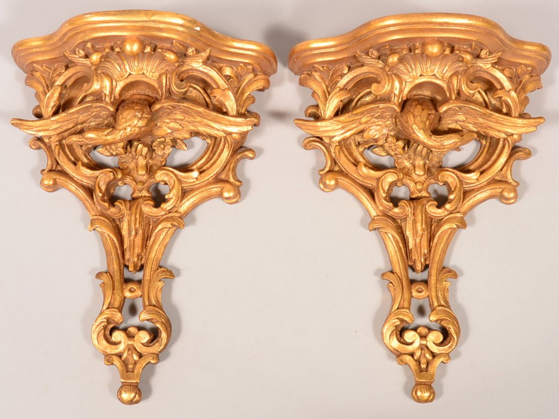 Pair of Signed Molded Gilted Plaster Wall Sconces.: Pair of Signed Molded Gilted Plaster Wall Sconces. Having spreadwing eagle, shell and scroll design, 17"h. x 13-1/8"w. Condition: Good with some loss.