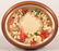 Victorian Fruit and Floral Yarn Work Wreath. Mounted in