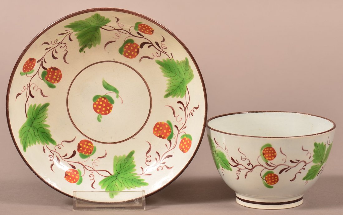 Pearlware Soft Paste China Strawberry Pattern: Pearlware Soft Paste China Strawberry Pattern Handleless Cup and Saucer. Saucer 5-3/8" diameter. Condition: Good, with minor base rim chips