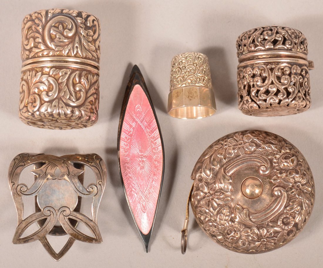 Lot of Five Vintage Sterling Silver Sewing Items.: Lot of Five Vintage Sterling Silver Sewing Items. Including a tatting shuttle with lavender enameling, chatelaine hook, retractable tape measure, spool holder and thimble case with thimble. Condition: