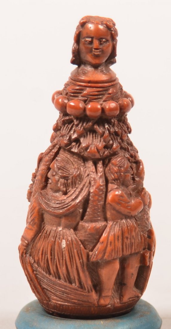 Finley Carved 19th Century Vegetable Ivory Needle Case.: Finley Carved 19th Century Vegetable Ivory Needle Case. Tear-drop form with raised carved figures, screw-top with woman's head finial. 2-1/2" high. Condition: Very good.