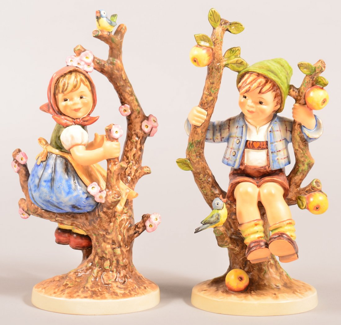 Hummel Figures; Large "Appletree Boy and Girl". Tmk-4: Hummel Figures; Large "Appletree Boy and Girl". Tmk-4 and 5, # 141/v and 142/v, appletree girl is signed, tallest 10-1/2"h. Condition: Very good.