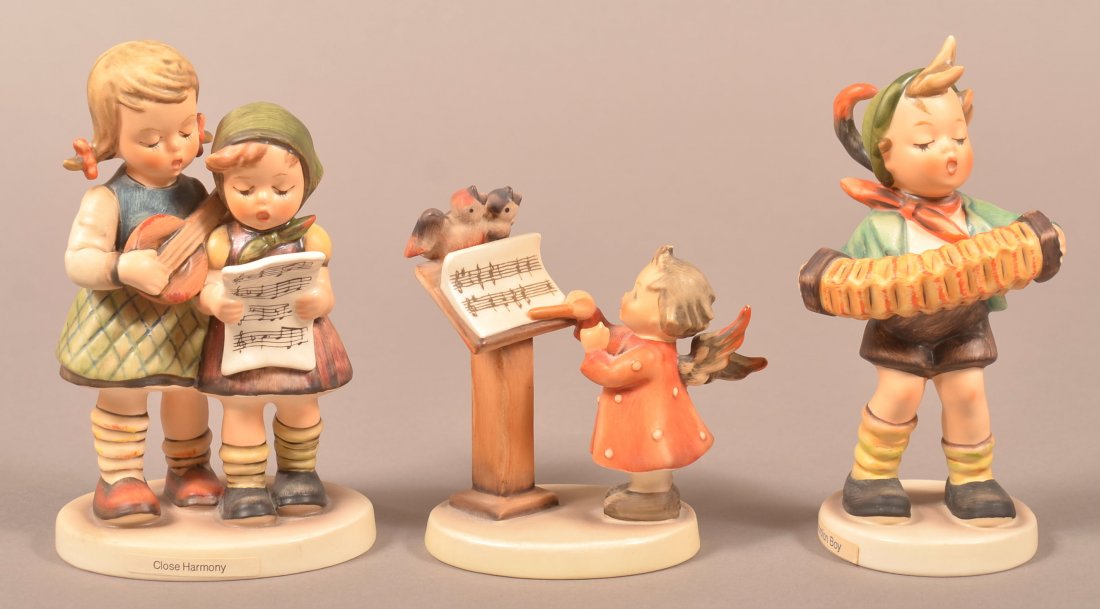Three Hummel Figure; Close Harmony # 336,Tmk-6, Bird: Three Hummel Figure; Close Harmony # 336,Tmk-6, Bird Duet # 169,Tmk-3, Accordion Boy # 185, Tmk-6, 4"h.- 5-1/2"h. Condition: Very good.