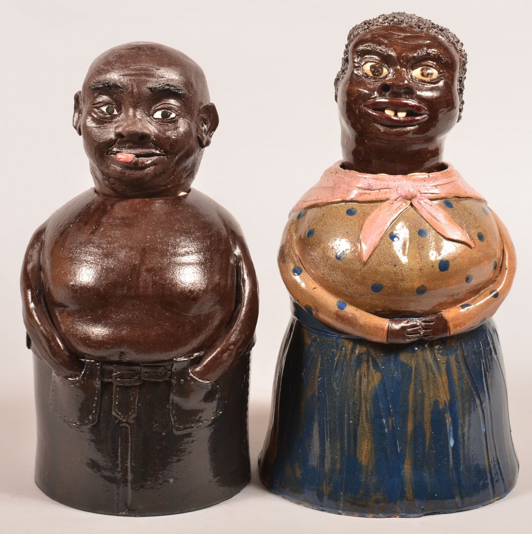 Pair of Southern Folk Pottery Black Figural Money: Pair of Southern Folk Pottery Black Figural Money Jars. Man and woman Signed Wilford Dean Cleveland, GA. Tallest 16"h. Condition: Very good.