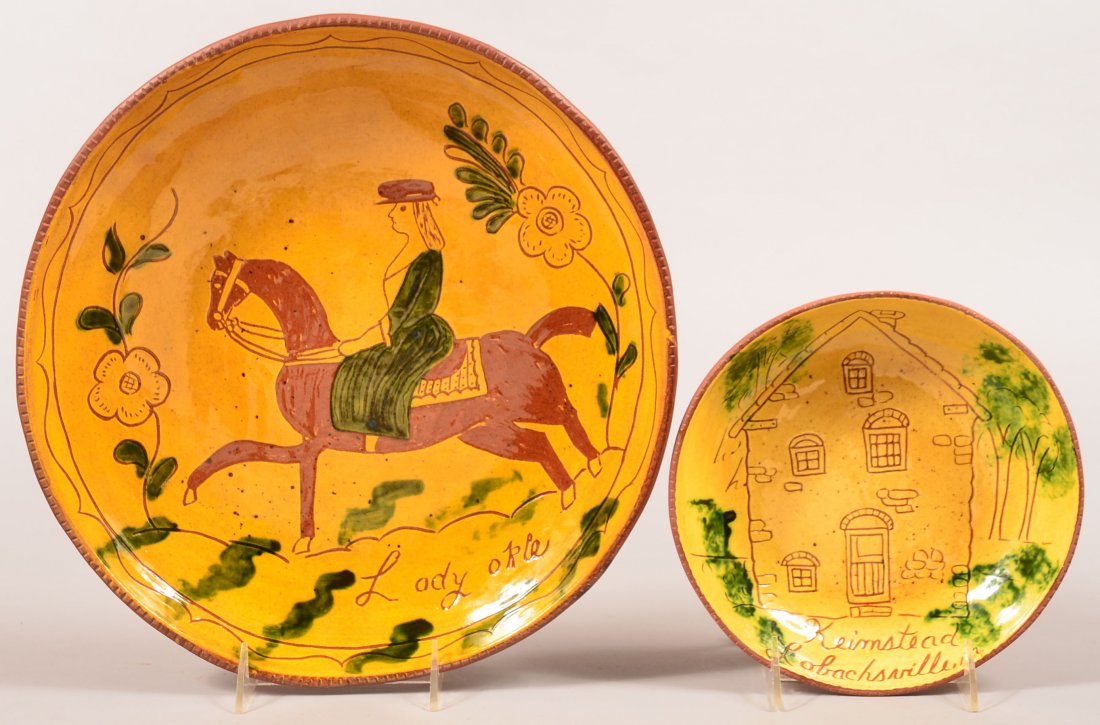 Two Breininger Sgraffito Decorated Plates. First is: Two Breininger Sgraffito Decorated Plates. First is Lady Okle, signed L & B Breininger 1973, 12-1/2"dia. 2nd is a Keimstead Lobachsville Pa, signed L & B Breininger 1976, 8"dia. Condition: Very good.