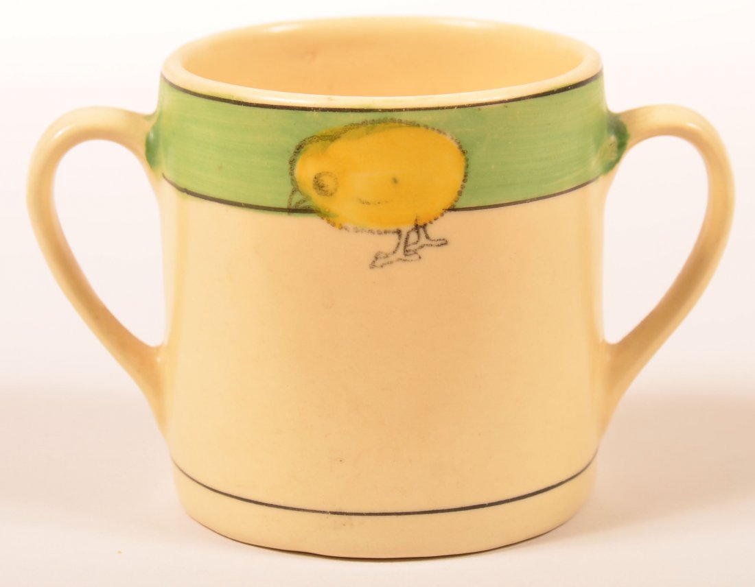 Roseville Pottery Juvenile Ware Double Handled Mug in: Roseville Pottery Juvenile Ware Double Handled Mug in Chick Pattern. Unmarked and stamped with number 3, 3"h. Condition: Very good.