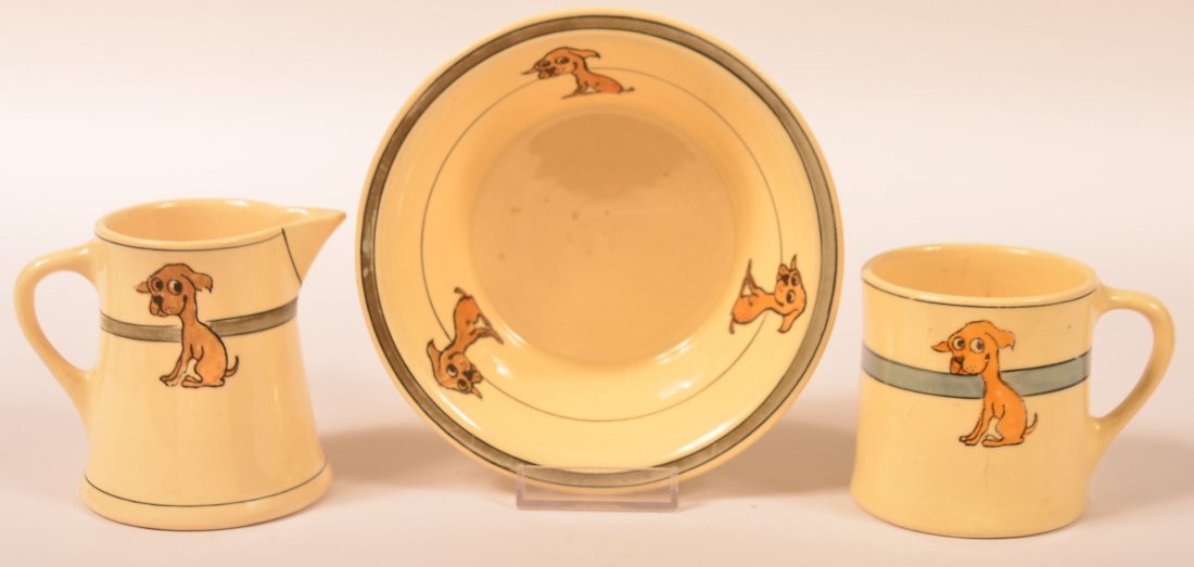 Three Roseville Pottery Juvenile Ware Dog Pattern: Three Roseville Pottery Juvenile Ware Dog Pattern Pieces. 6"dia. Cereal Bowl, 3"h. Handled Mug, 3-1/2"h. Cream Pitcher. All stamped Rv, Condition: Very good.