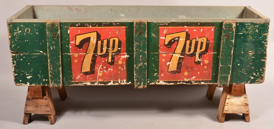 Large 7UP Wooden Frame Advertising Cooler with tin: Large 7UP Wooden Frame Advertising Cooler with tin interior and drainage hole. 20-1/2"h. x 72"l. x 21"w. Condition: Good with use and wear losses.