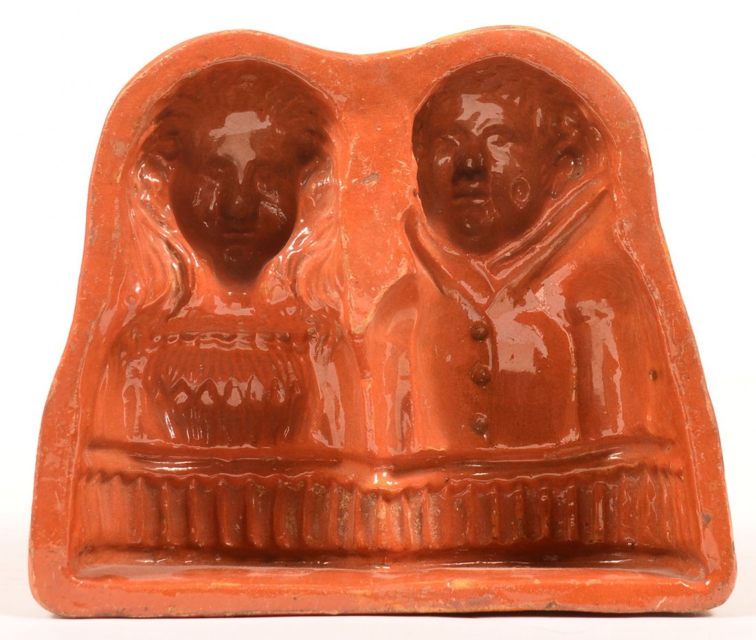 19th Century Interior Glazed Redware Pottery Figural: 19th Century Interior Glazed Redware Pottery Figural Mold. Man and woman half bust mold, possibly George and Martha Washington. 8"h. x 9-3/4"w. x 3-1/4"d. Condition: Very good with glazing wear.