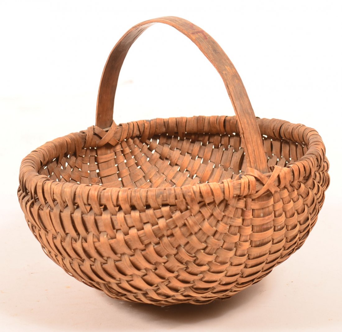 Woven Splint Oak Egg Basket. Round form, bentwood: Woven Splint Oak Egg Basket. Round form, bentwood handle and rim. 8-1/2"h x 10"diam. Condition: Good with use wear.