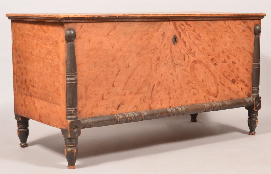 Pennsylvania Sheraton Softwood Paint Decorated Blanket: Pennsylvania Sheraton Softwood Paint Decorated Blanket Chest. Salmon ground with black turned stiles and base molding, interior till and turned feet. 28"h. x 52"w. x 23"d. Condition: Good with wear.