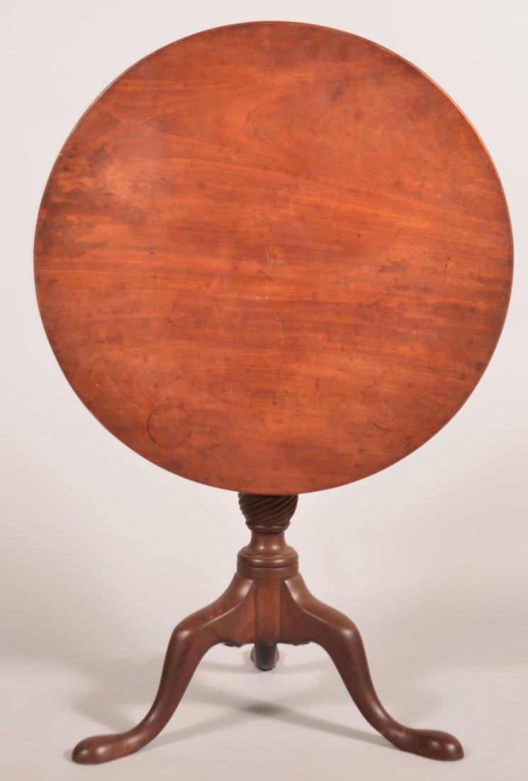 Massachusetts Queen Anne Mahogany Tilt Top Tea Table.: Massachusetts Queen Anne Mahogany Tilt Top Tea Table. Circular top, turned pedestal with spiral carved urn, cabriole legs and pad feet. 27"h. x 27-1/2" diameter. Condition: very good with minor wear.
