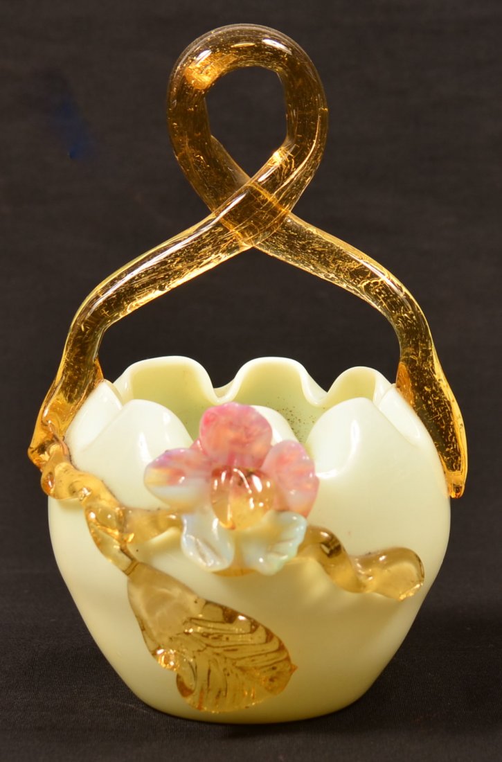 Victorian Art Glass Basket Attributed to Stevens &: Victorian Art Glass Basket Attributed to Stevens & Williams. Crimpt top opaque custard glass with applied amber looped handle and leaves, specled cranberry and custard colored flower. Blown with broke