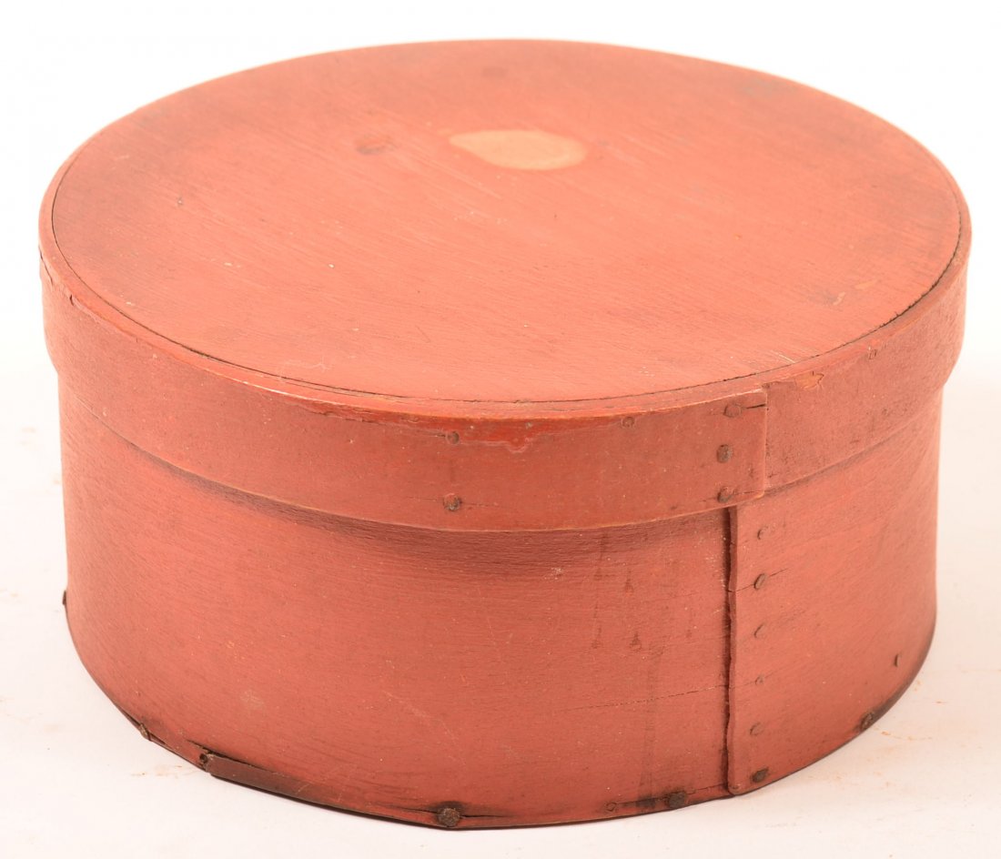 19th Century Round Bentwood Pantry Box with Original: 19th Century Round Bentwood Pantry Box with Original Red Paint. Over lapped joints with iron tack supports. 4-1/2"h. x 9"d. Condition: Good with stains and losses at base.
