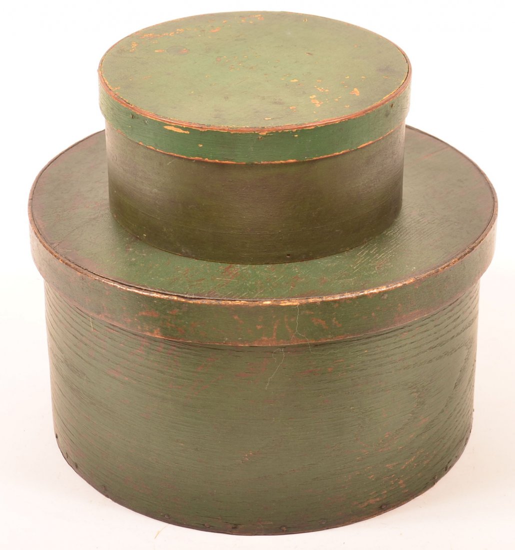 Two 19th Century Round Bentwood Pantry Boxes with Green: Two 19th Century Round Bentwood Pantry Boxes with Green Paint. Over lapped joints with iron tack supports. 3-3/4"h. x 7-3/4"diam. and 6-7/8"h. x 12" diam. Condition: Good with some losses and cracks.