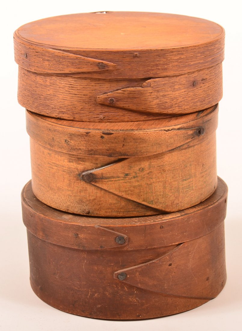 Three Various 19th Century Pantry Boxes. One oval form: Three Various 19th Century Pantry Boxes. One oval form and two round form. All having tapered lapped joints with iron tack supports. Oval measures 1-7/8"h. x 5-1/2"w. x 4-1/4"d. Round boxes measure 2-