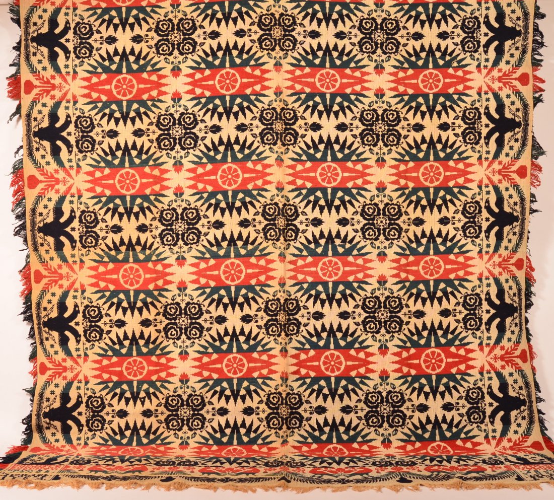 1854 Ohio Four Colored Woven Coverlet. Two part: 1854 Ohio Four Colored Woven Coverlet. Two part coverlet having starburst and floral design, eagle and floral border with corner blocks marked W. In. Mt Vernon Knox County Ohio by Jacob and Michael Ar